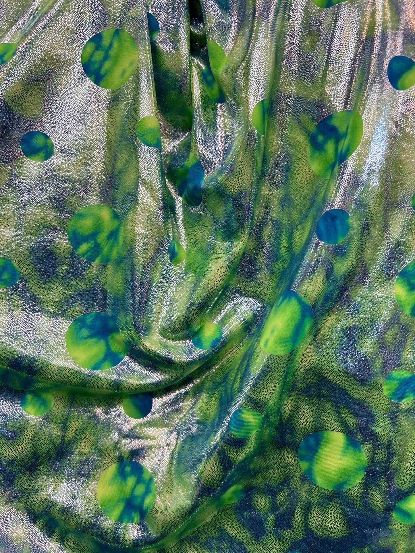 Water design Blue/green foiled print on nylon spandex with silver foil 4-way stretch 58/60” Sold by the YD. Ships Worldwide