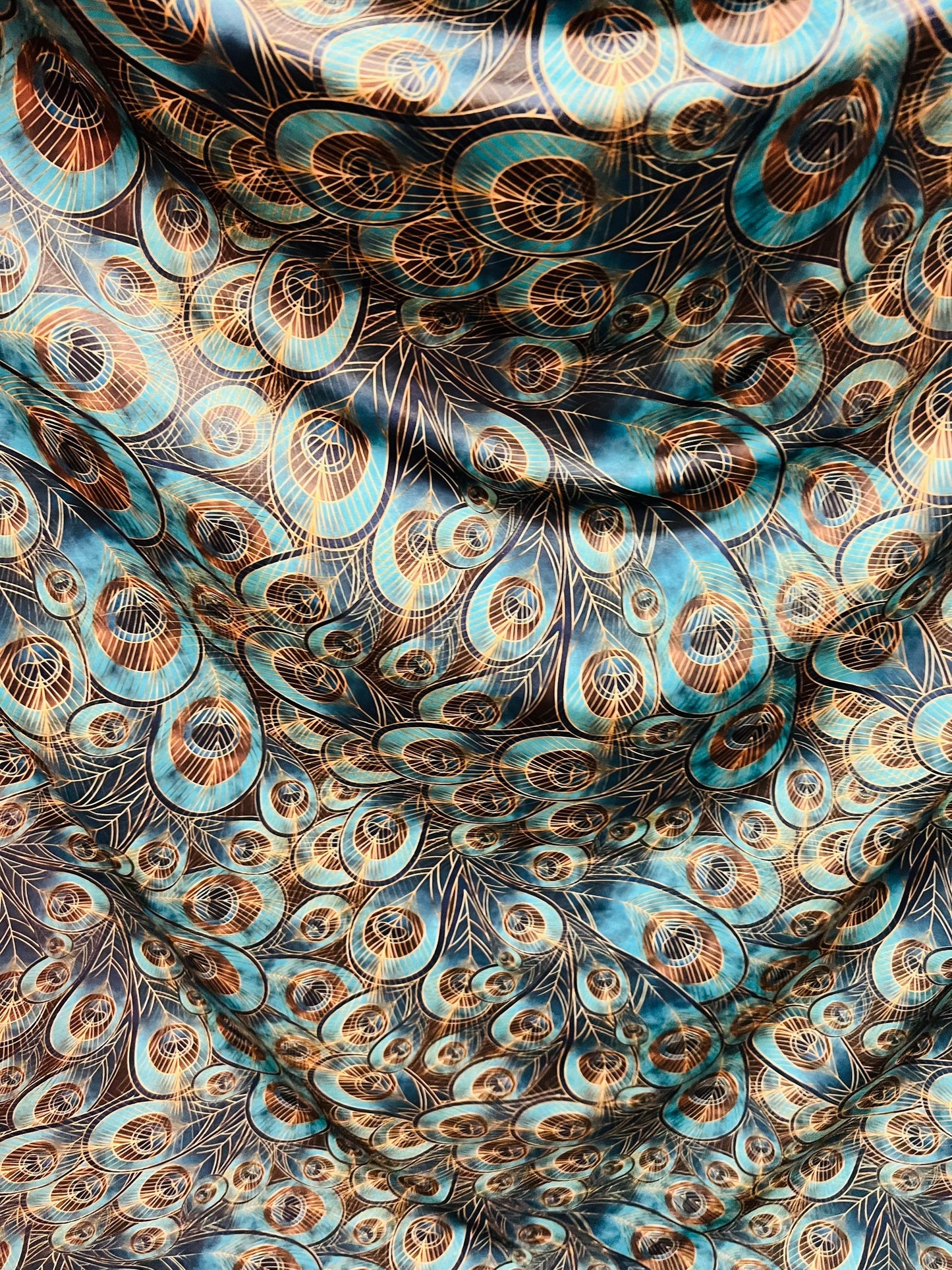 Peacock design New print in stock  Teal blue/Gold print on great quality of nylon spandex 4-way stretch 58/60”