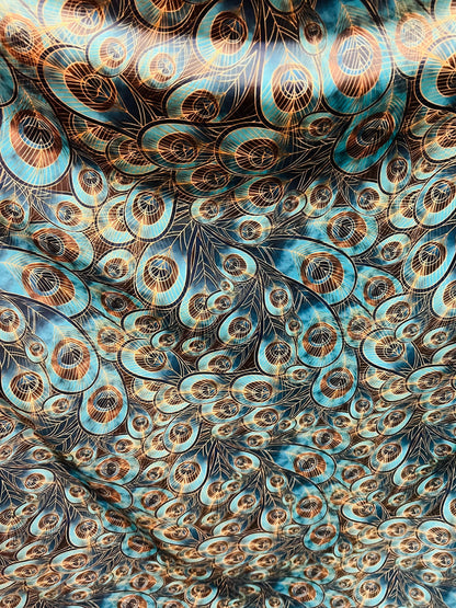 Peacock design New print in stock  Teal blue/Gold print on great quality of nylon spandex 4-way stretch 58/60”