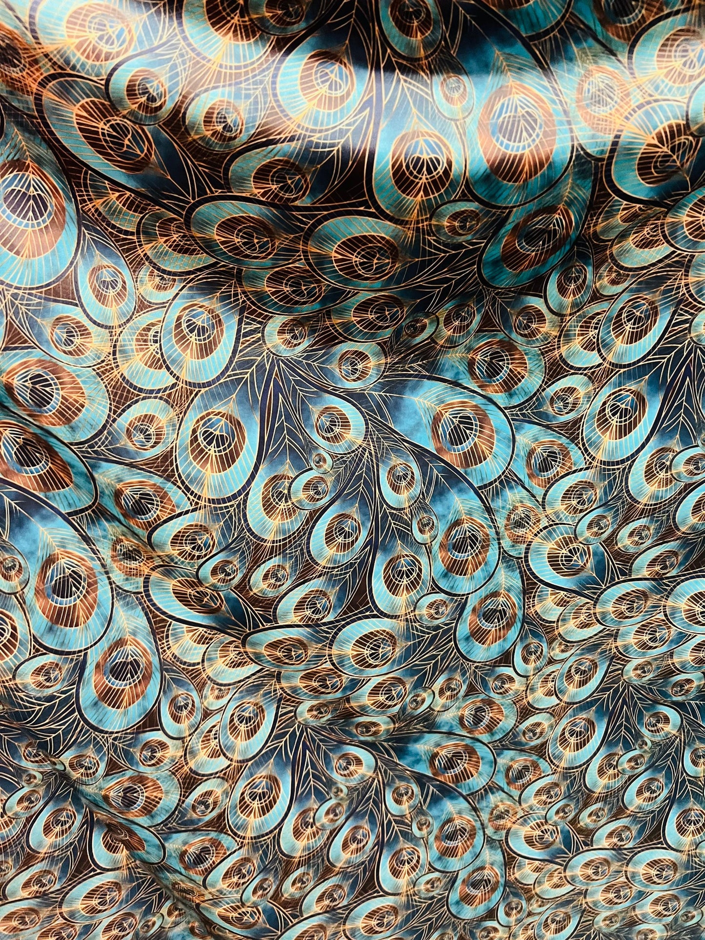 Peacock design New print in stock  Teal blue/Gold print on great quality of nylon spandex 4-way stretch 58/60”