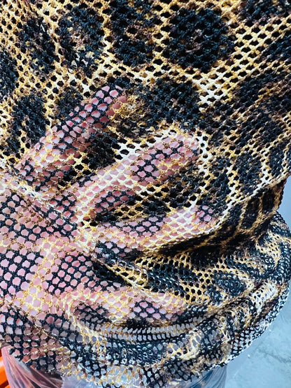 Exotic Leopard design print on poly fishnet 2-way stretch 58/60” Sold by the YD. Ships Worldwide from Los Angeles California USA