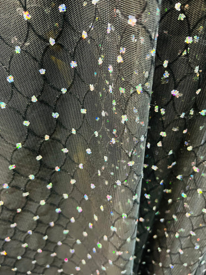 Oval design flocking glitter stretch mesh one way stretch 58/60”  Sold by the YD. Ships Worldwide from Los Angeles California USA