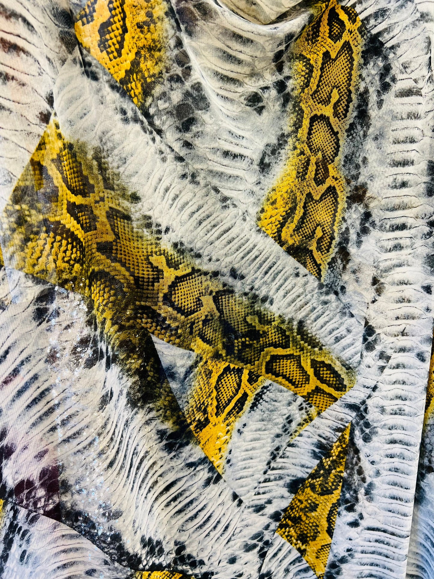 Snake design print on great quality of nylon power mesh 4-way stretch 58/60” Sold by the YD. Ships Worldwide from Los Angeles California USA