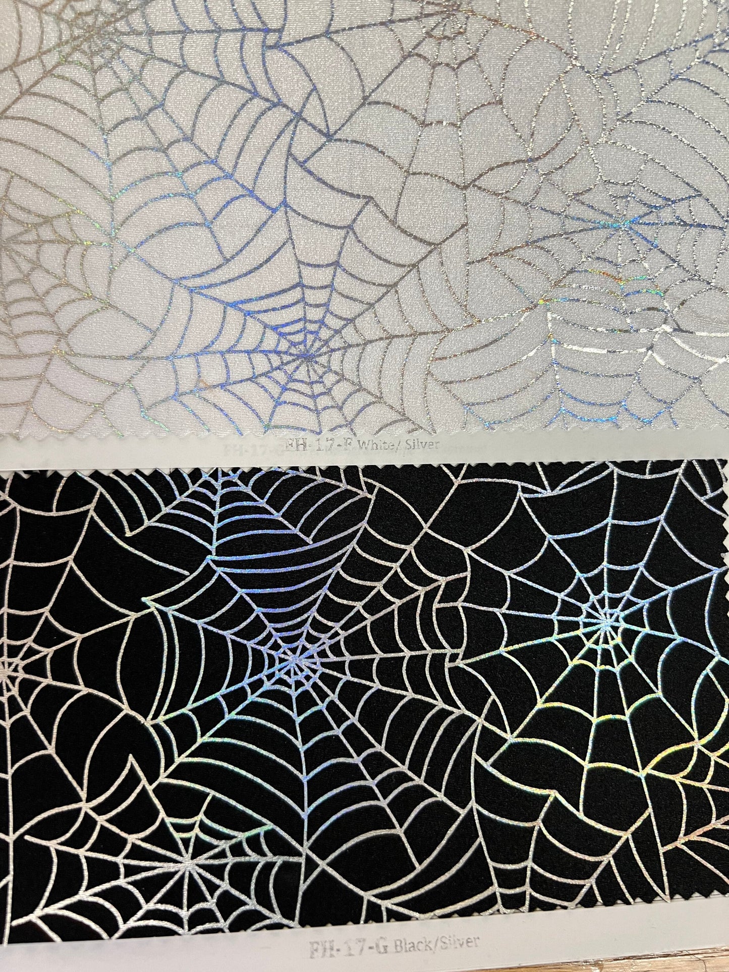 Spiderweb design hologram metallic nylon spandex 4-way stretch 58/60” Sold by the YD. Ships Worldwide from Los Angeles California USA.