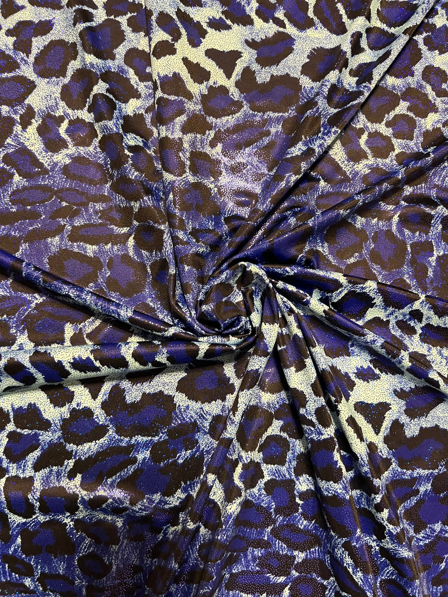 Exotic Leopard design Animal print with foil print on best quality of nylon spandex 4-way stretch 58/60” Sold by the YD.