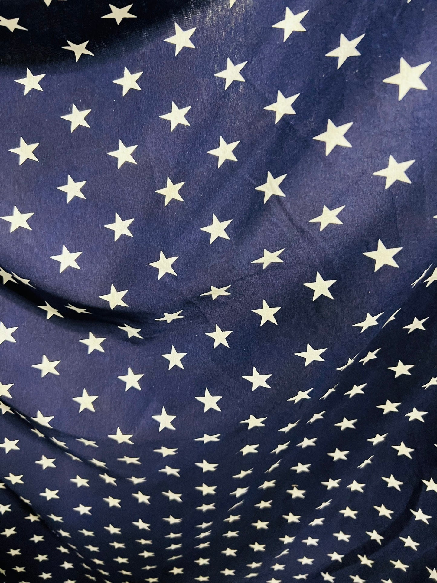 Freedom stars design print on cotton jersy 2-way stretch 58/60” Navy blue/White. Sold by the YD.