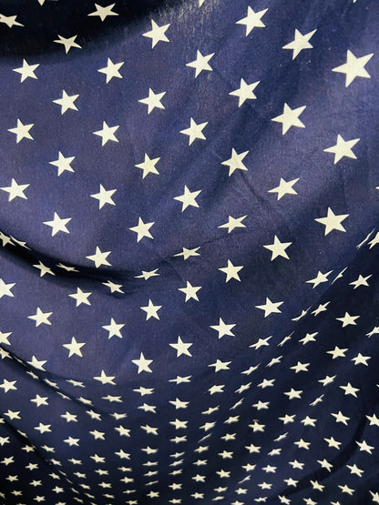 Freedom stars design print on cotton jersy 2-way stretch 58/60” Navy blue/White. Sold by the YD.