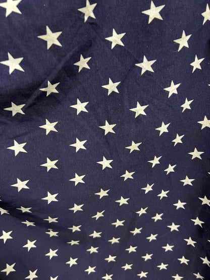 Freedom stars design print on cotton jersy 2-way stretch 58/60” Navy blue/White. Sold by the YD.