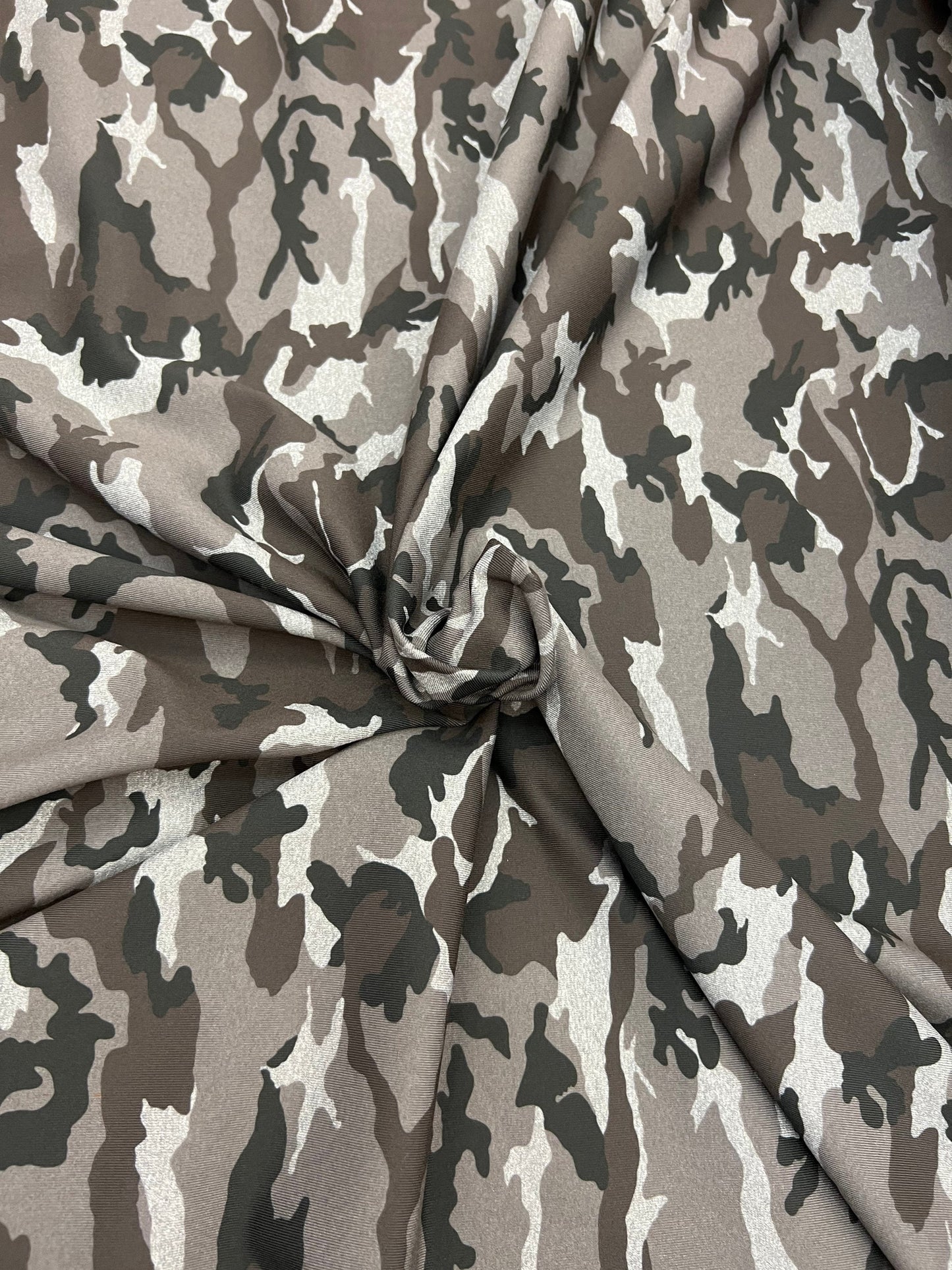 Camouflage design Gray/Black/Silver print on great quality of nylon spandex 4-way stretch 58/60” Sold by the YD. Ships Worldwide from LA