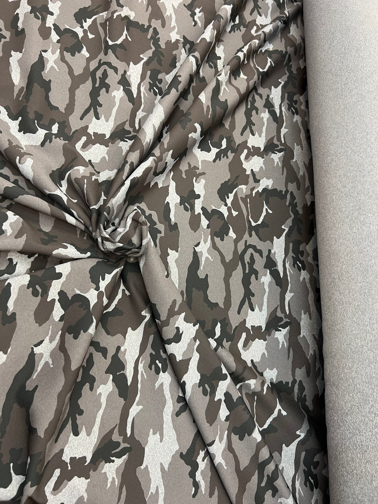 Camouflage design Gray/Black/Silver print on great quality of nylon spandex 4-way stretch 58/60” Sold by the YD. Ships Worldwide from LA