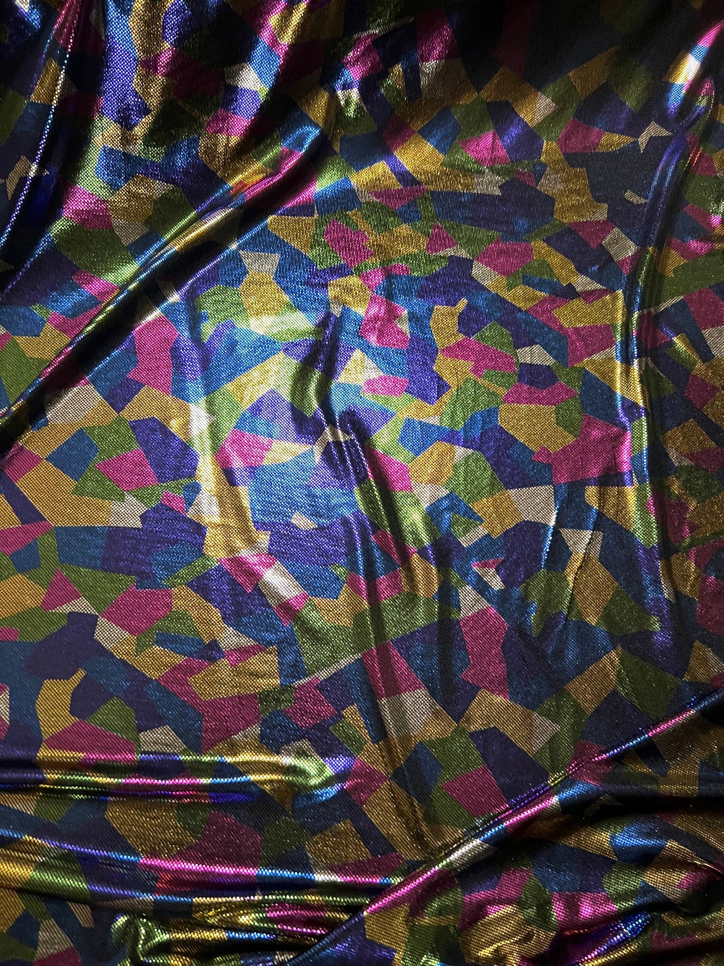 Shattered glass design metallic nylon spandex 2-way stretch purple/multicolor 58/60” Sold by the YD. Ships Worldwide from Los Angeles CA