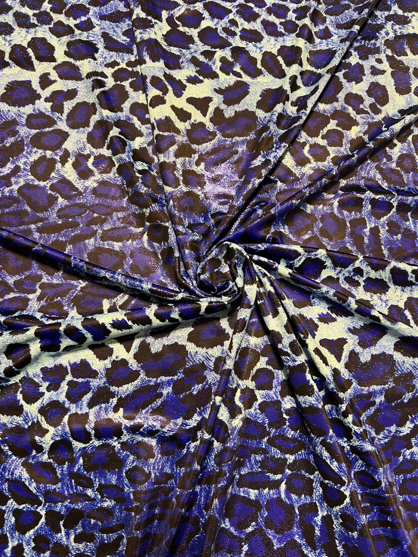 Exotic Leopard design Animal print with foil print on best quality of nylon spandex 4-way stretch 58/60” Sold by the YD.