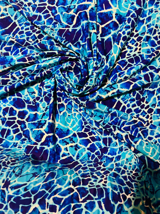 New abstract design Aqua blue color print on best quality of nylon spandex 4-way stretch 58/60”