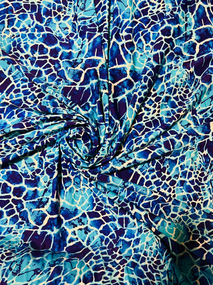 New abstract design Aqua blue color print on best quality of nylon spandex 4-way stretch 58/60”