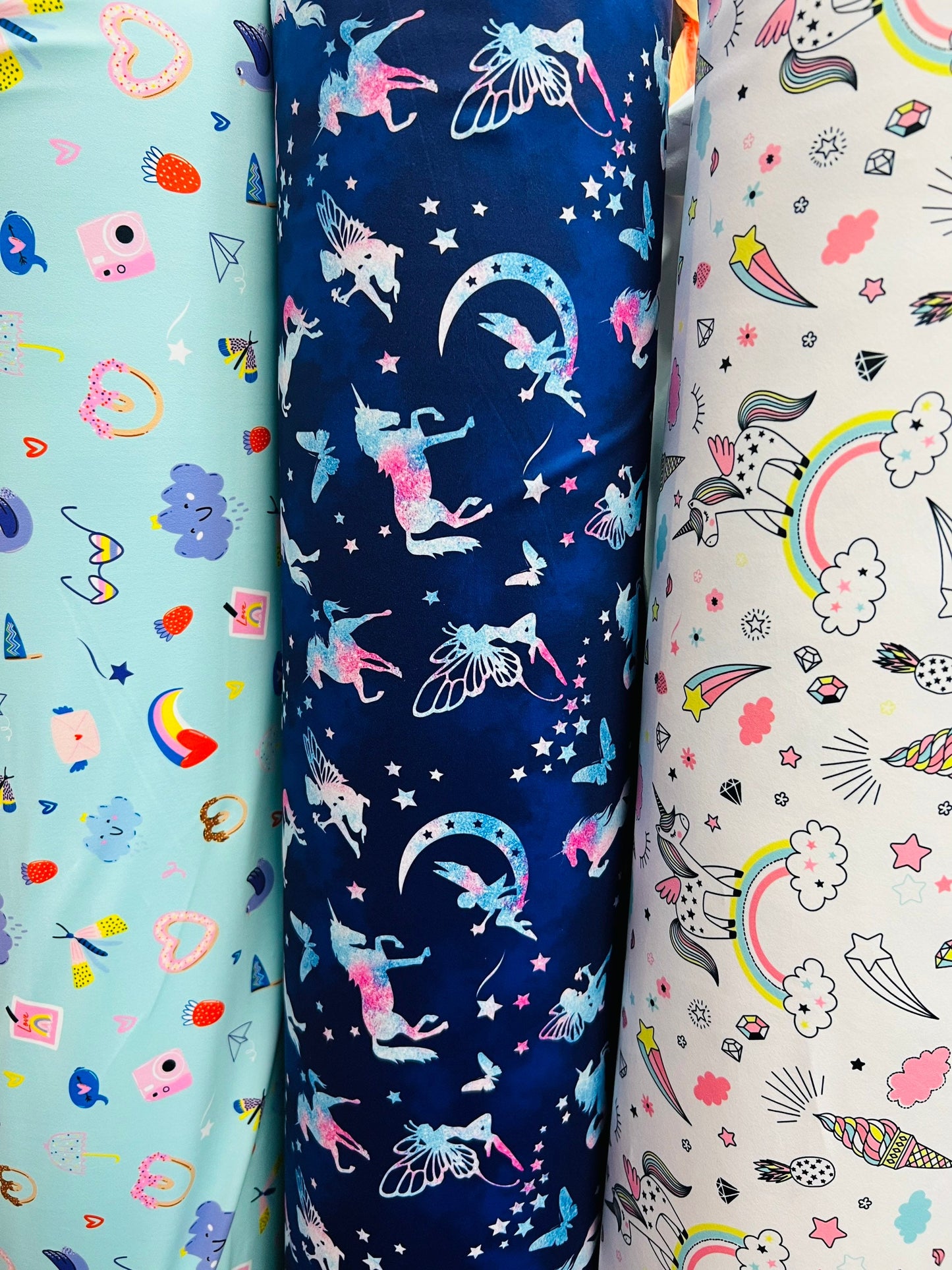 Multi Unicorn design & Multi print nylon spandex 4-way stretch 58/60” Sold by the YD. Ships Worldwide from Los Angeles California USA.