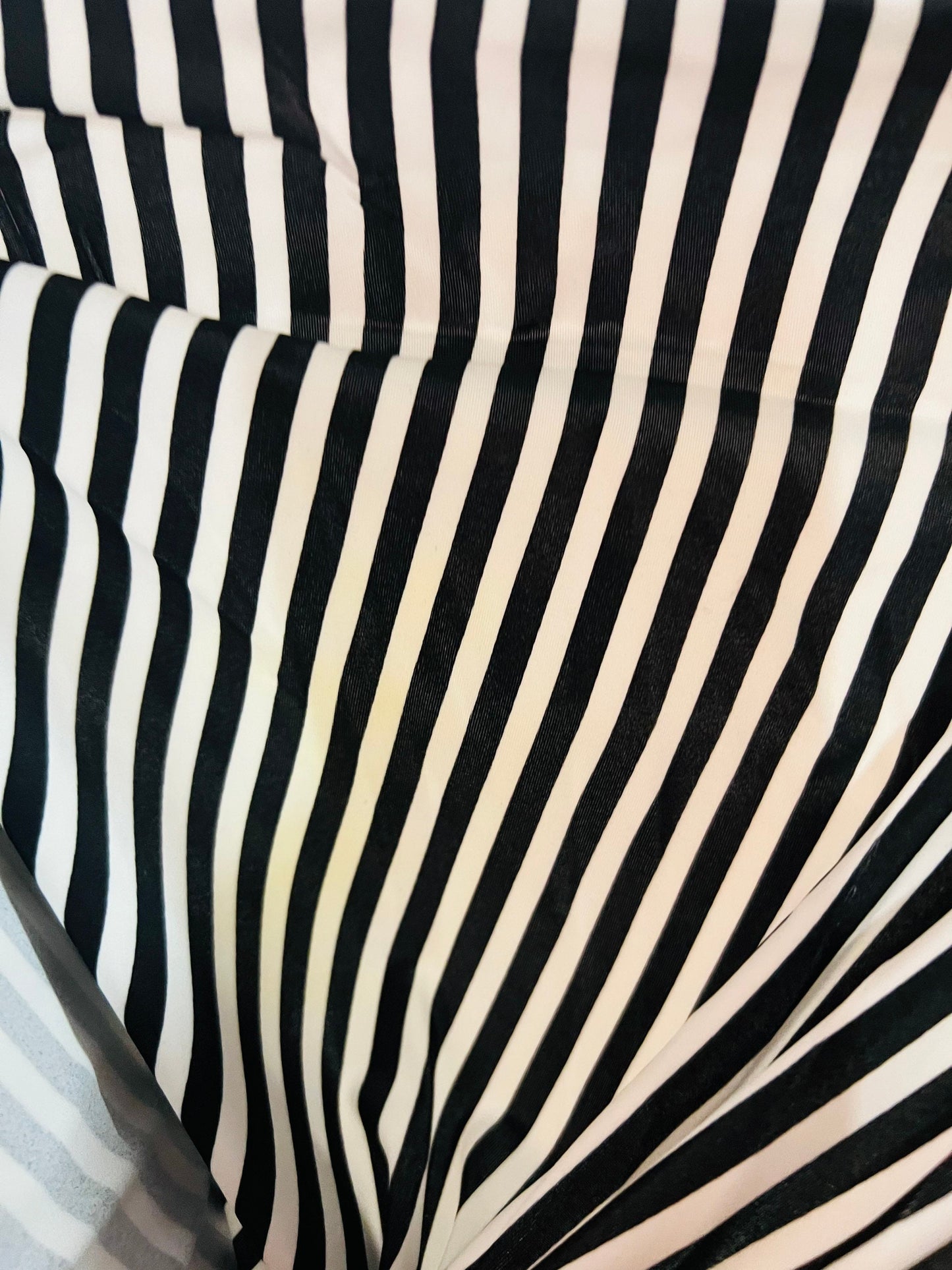 Striped design 1/2” White/Black print on great quality of nylon spandex 4-way stretch 58/60” Sold by the YD. Ships Worldwide from L.A