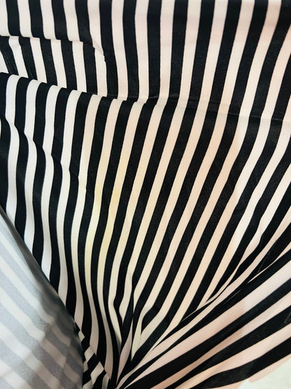 Striped design 1/2” White/Black print on great quality of nylon spandex 4-way stretch 58/60” Sold by the YD. Ships Worldwide from L.A