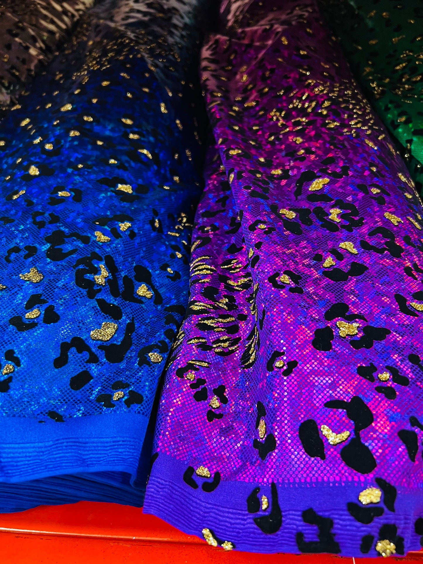 New Jaguar design exotic animal print on hologram metallic nylon spandex with flocking 4-way stretch 58/60” Sold by the YD.