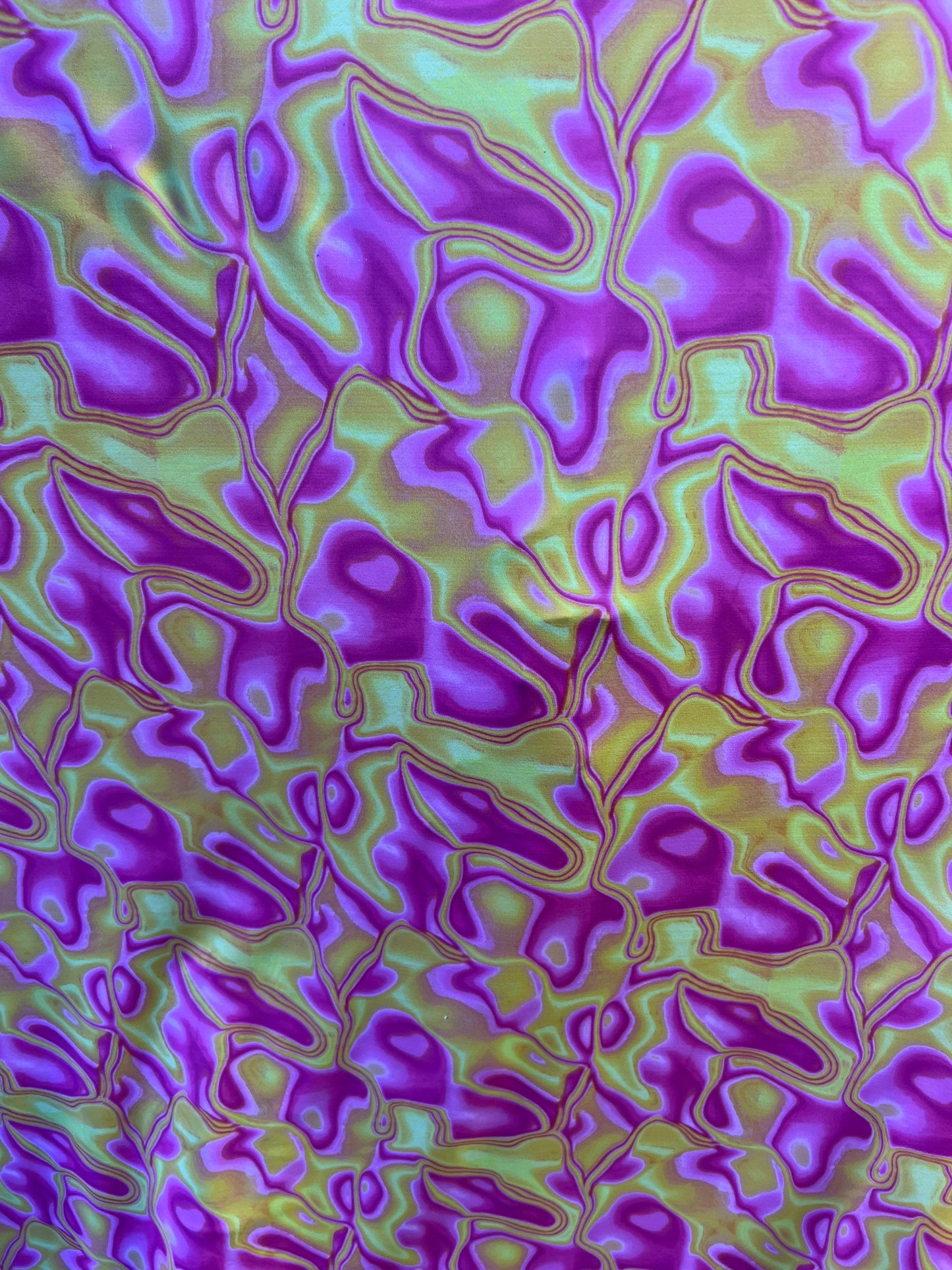 New abstract lava design Magenta/Yellow print on best quality of nylon spandex 4-way stretch 58/60” Sold by the YD. Ships Worldwide