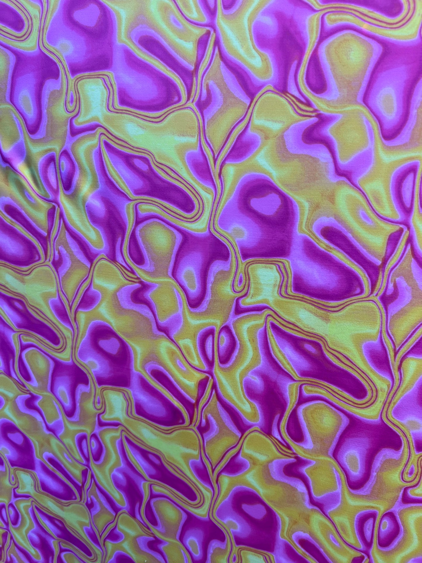 New abstract lava design Magenta/Yellow print on best quality of nylon spandex 4-way stretch 58/60” Sold by the YD. Ships Worldwide