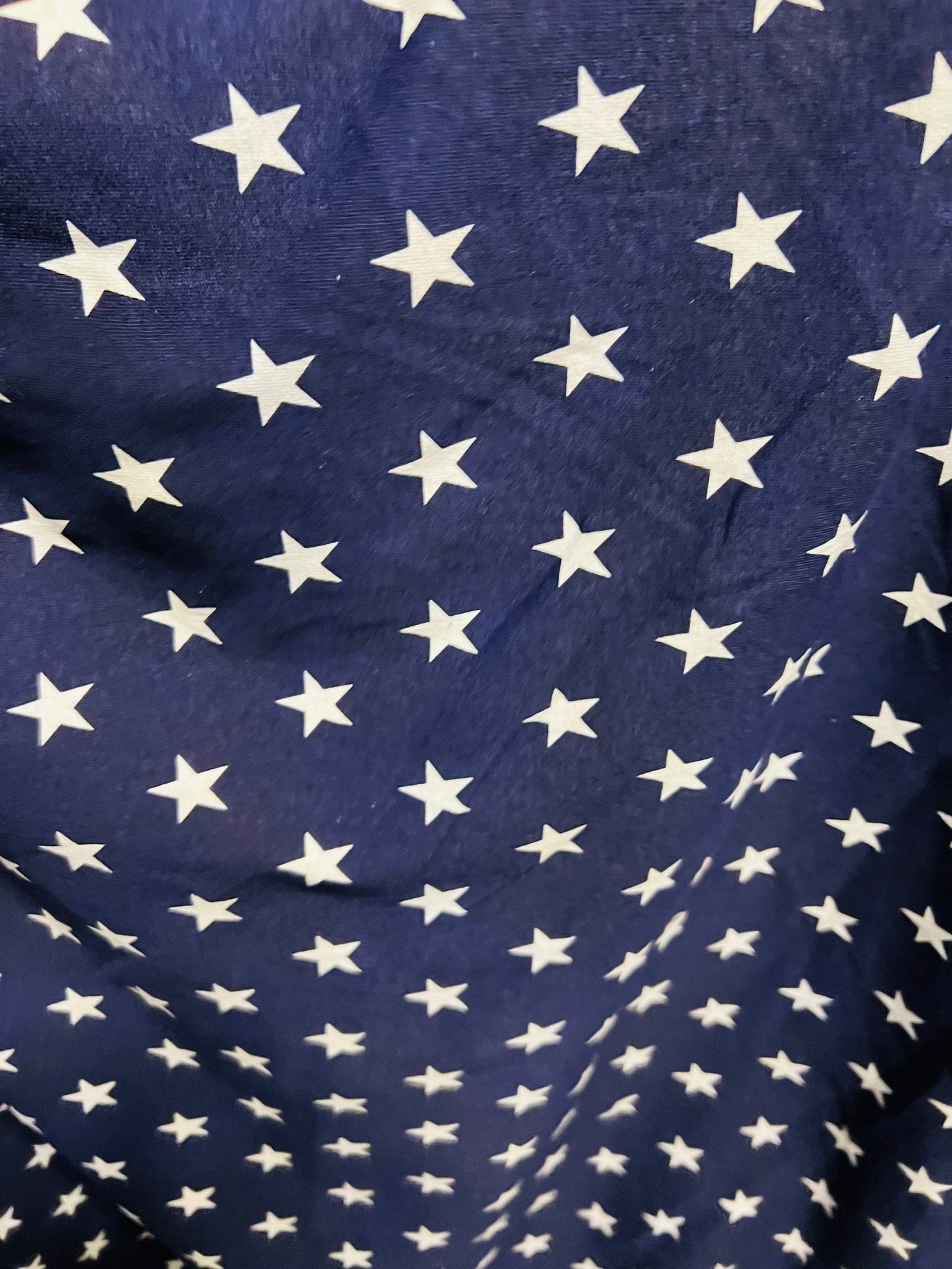 Freedom stars design print on cotton jersy 2-way stretch 58/60” Navy blue/White. Sold by the YD.