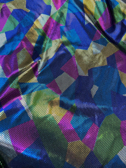 Shattered glass design metallic nylon spandex 2-way stretch purple/multicolor 58/60” Sold by the YD. Ships Worldwide from Los Angeles CA