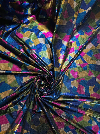 Shattered glass design metallic nylon spandex 2-way stretch purple/multicolor 58/60” Sold by the YD. Ships Worldwide from Los Angeles CA