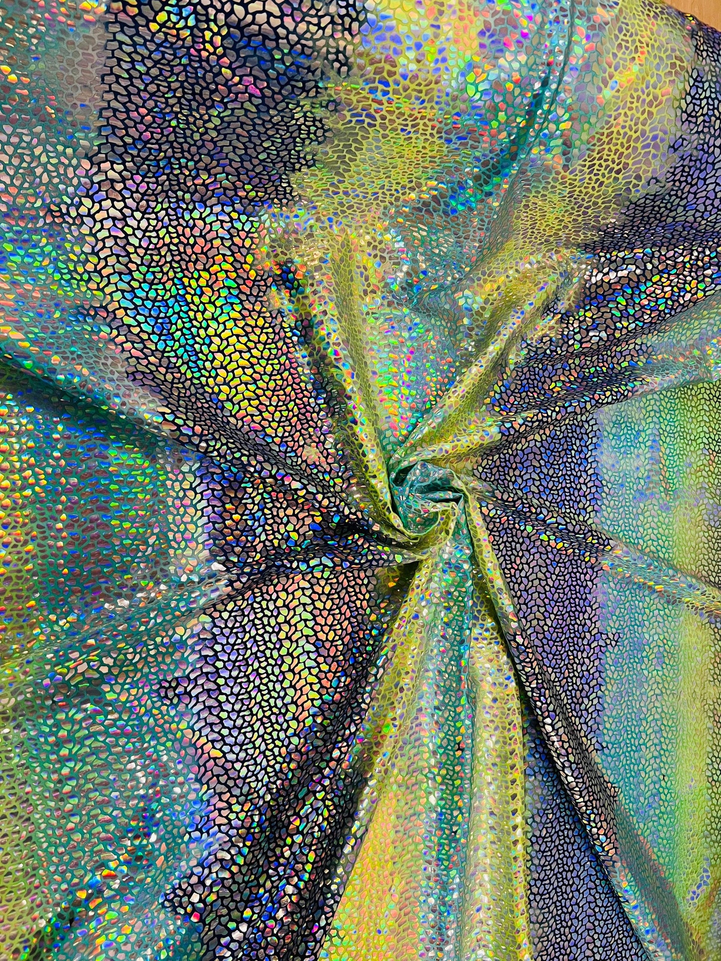 Dragón scales design hologram sequins on tie dye nylon spandex 4-way stretch 58/60” Sold by the YD. Ships Worldwide from Los Angeles CA