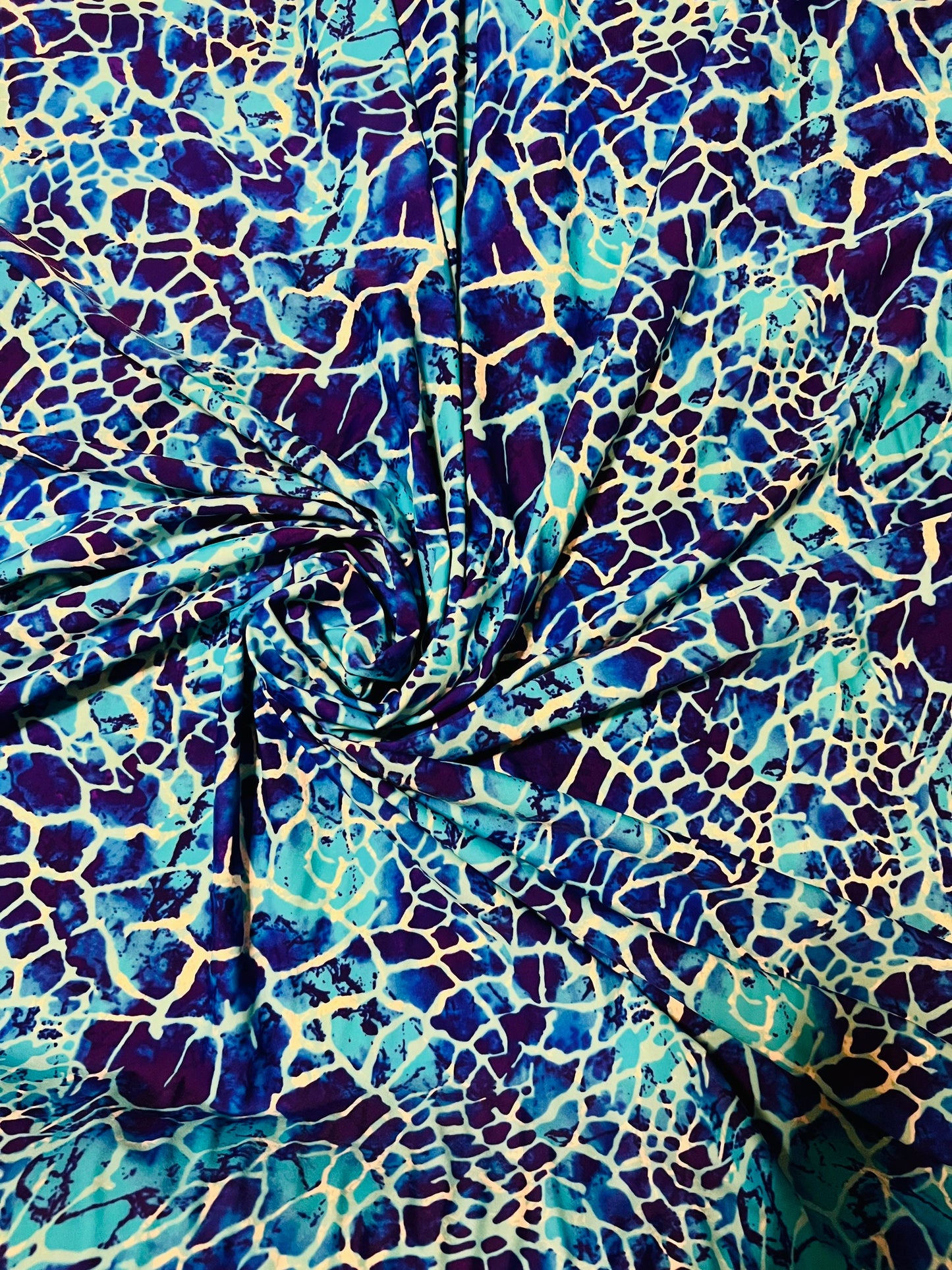 New abstract design Aqua blue color print on best quality of nylon spandex 4-way stretch 58/60”