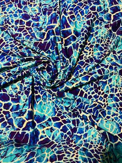 New abstract design Aqua blue color print on best quality of nylon spandex 4-way stretch 58/60”