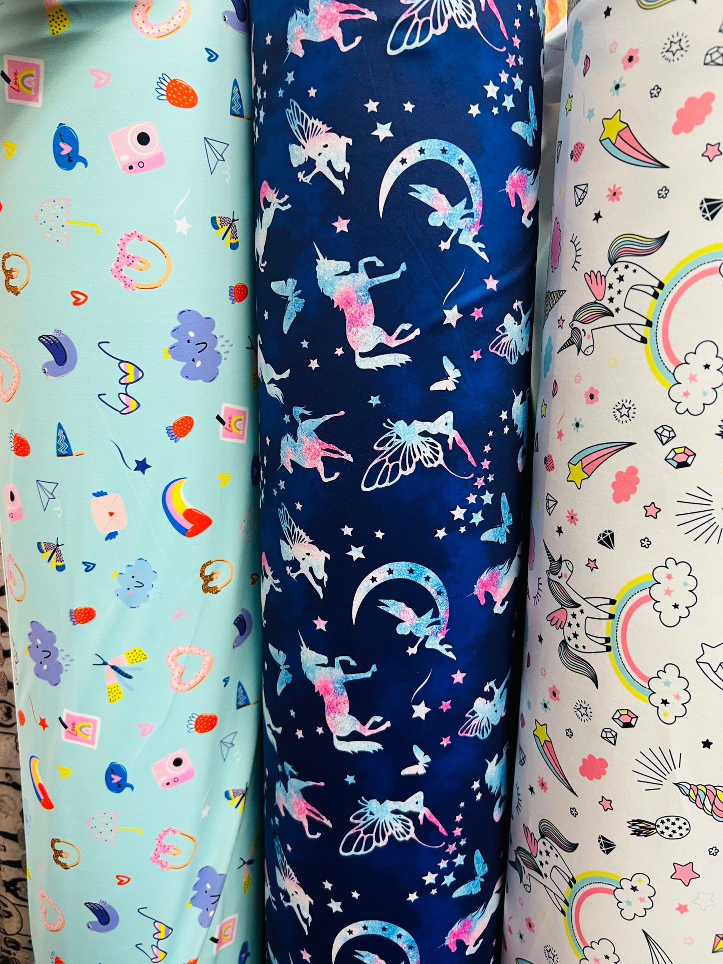 Multi Unicorn design & Multi print nylon spandex 4-way stretch 58/60” Sold by the YD. Ships Worldwide from Los Angeles California USA.