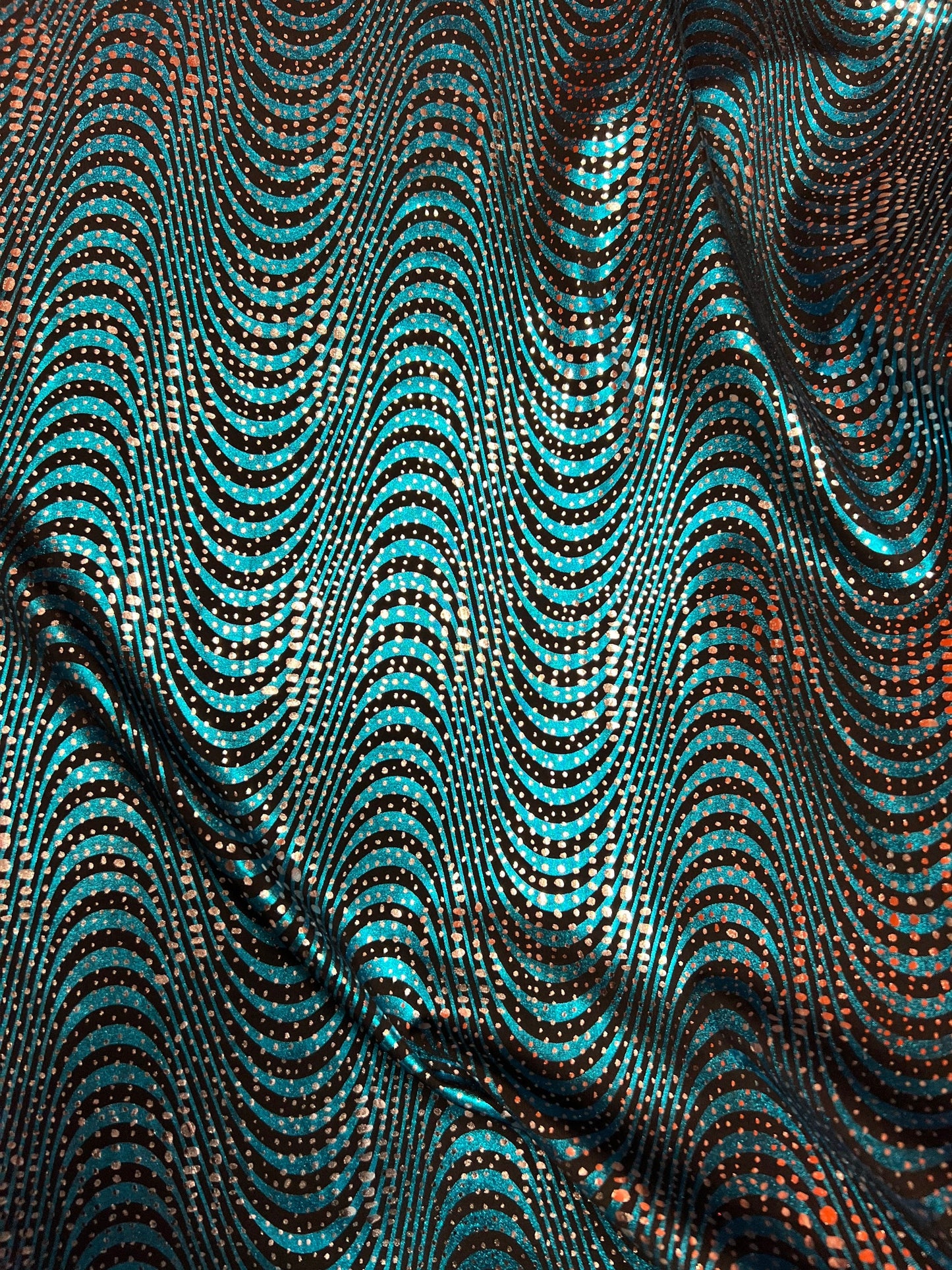 New abstract design metallic nylon spandex Teal/silver 4-way stretch 58/60” Sold by the YD. Ships Worldwide from Los Angeles California USA.