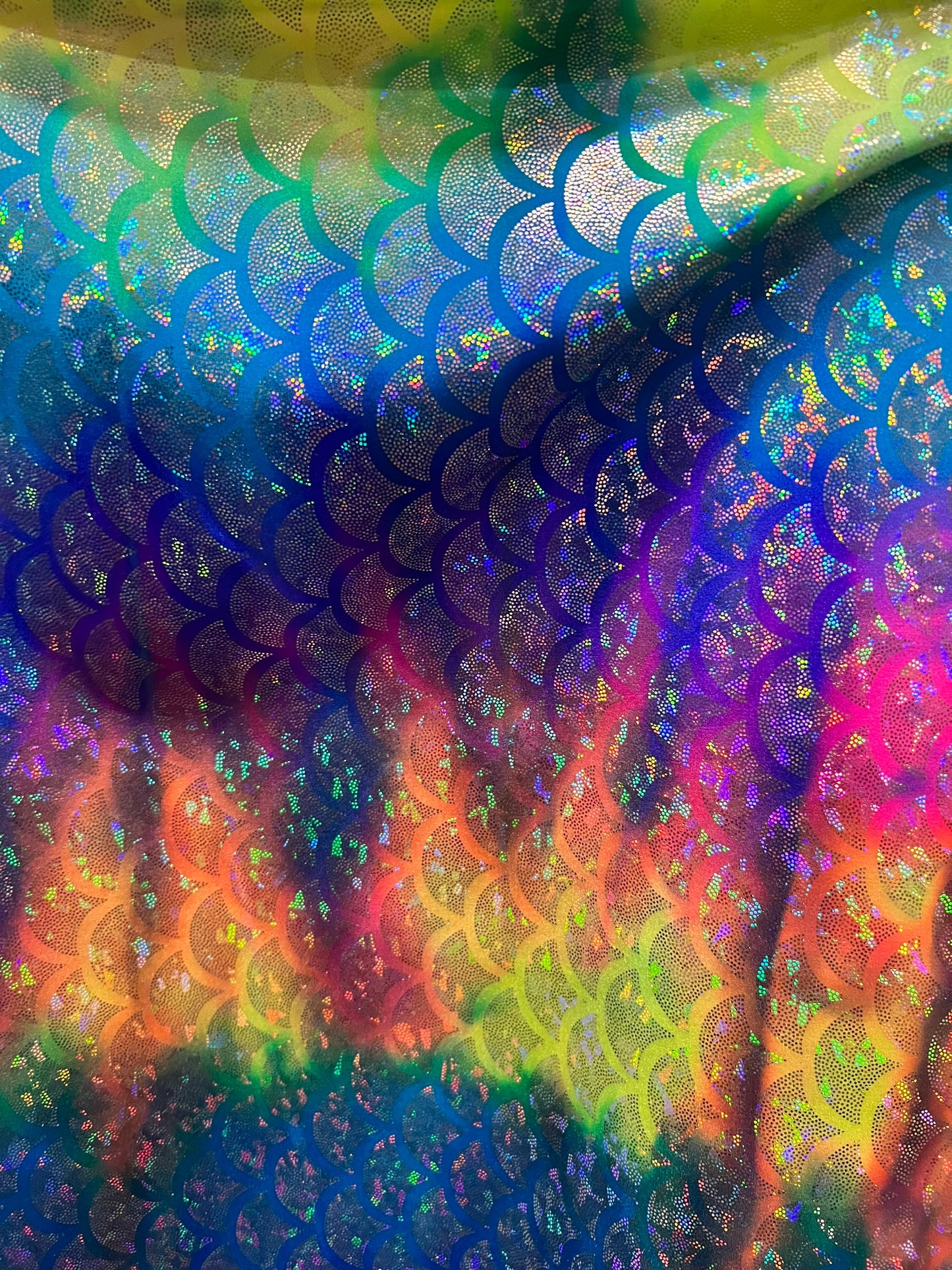 Rainbow Sirena design jumbo size hologram metallic nylon spandex 4-way stretch 58/60” Sold by the YD. Ships Worldwide from Los Angeles CA