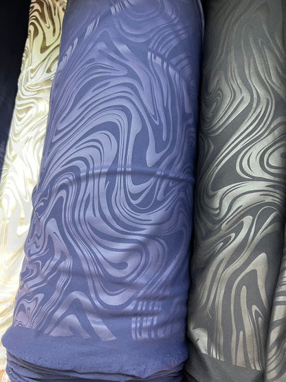 New Modern abstract design foiled nylon spandex 4 way stretch 58/60” Sold by the YD.