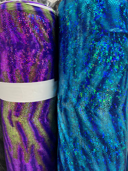 New Disco cobra design Nylon spandex with hologram foil 4way Stretch 58/60” Sold by the YD. Ships worldwide from Los Angeles California USA