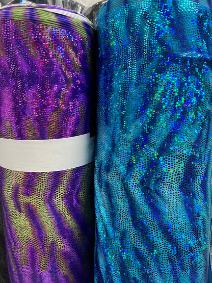 New Disco cobra design Nylon spandex with hologram foil 4way Stretch 58/60” Sold by the YD. Ships worldwide from Los Angeles California USA