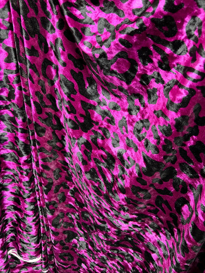 New Leopard design Magenta/Black exotic animal print on 4-way stretch velvet 58/60” Sold by the YD. Ships worldwide from Los Angeles CA