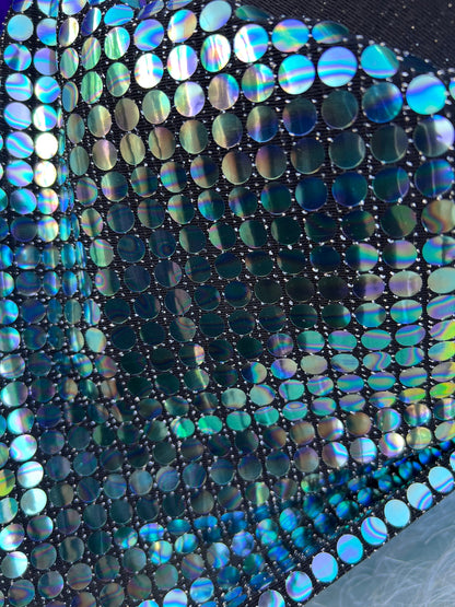 New Iridescent disco sequins design on metallic poly spandex 2-way stretch 58/60” Sold by the YD. Ships Worldwide from Los Ángeles