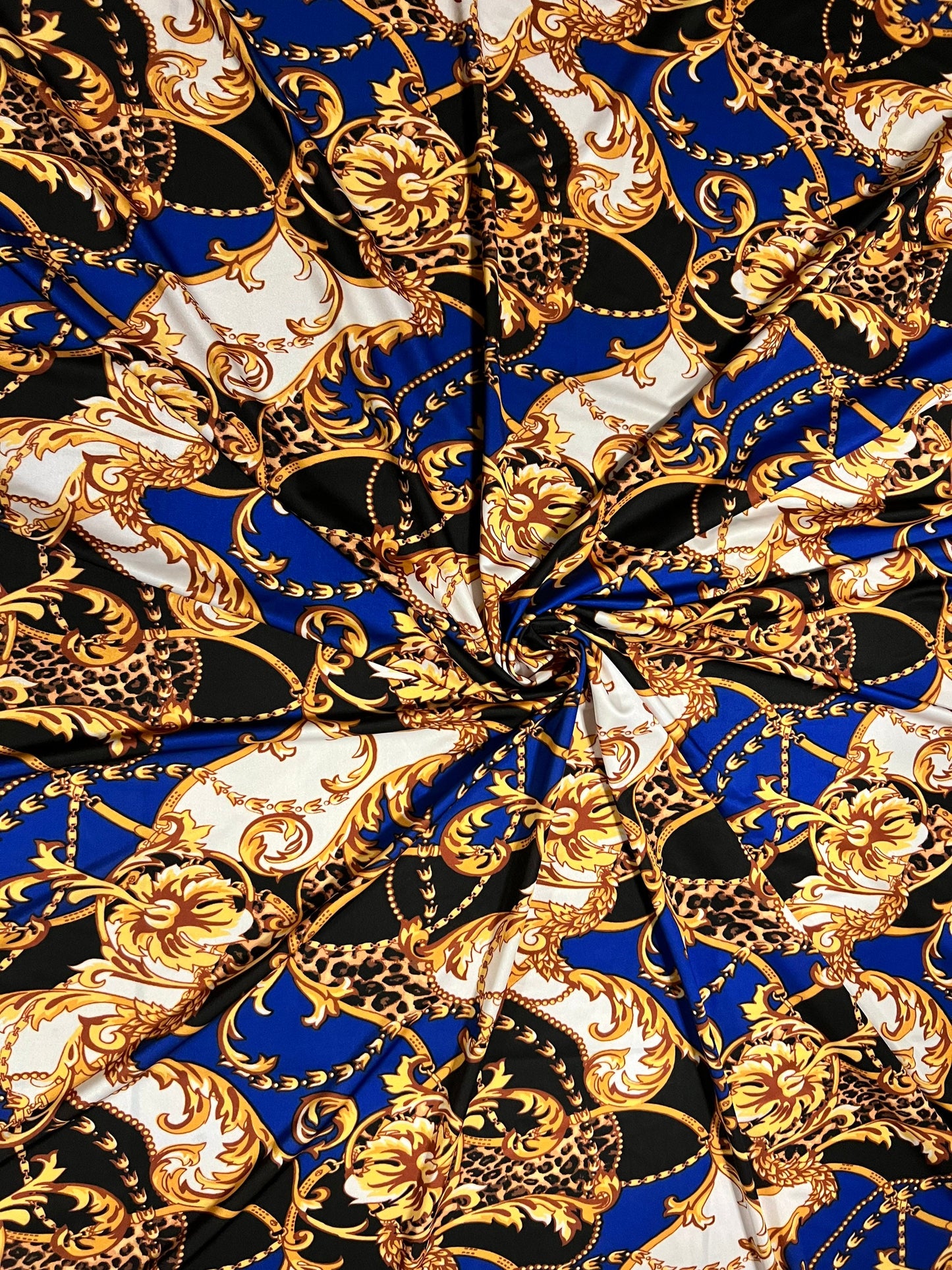 New Brand fashion design sapphire/gold print on great quality of nylon spandex 4-way stretch 58/60” Sold by the YD. Ships Worldwide