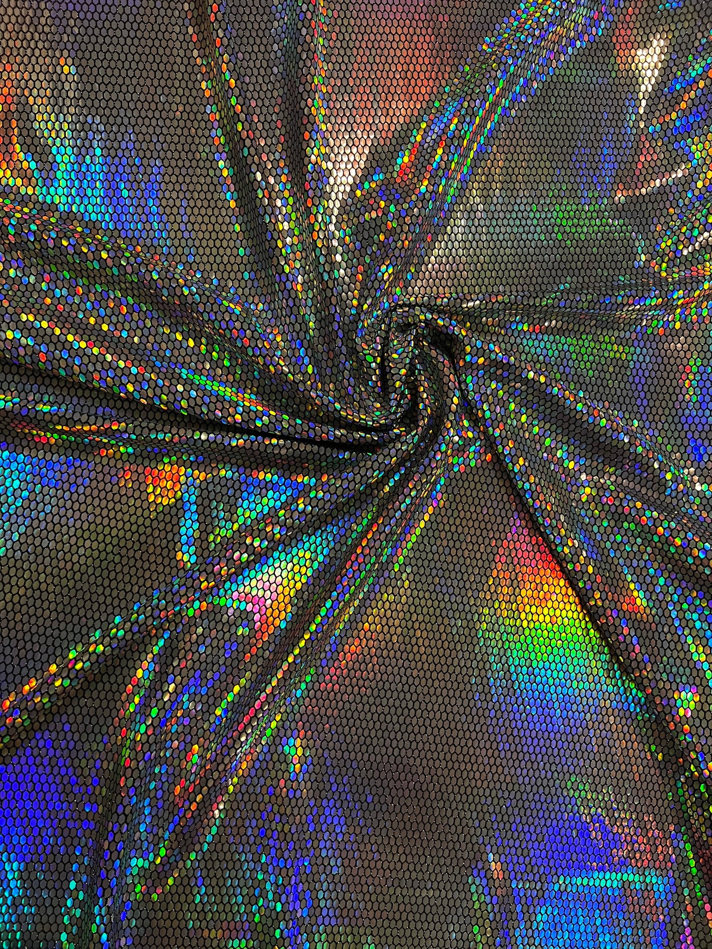 Honeycomb design iridescent silver lacer sequins on metallic spandex 2-way stretch 58/60” Sold by the YD. Ships Worldwide from Los Angeles