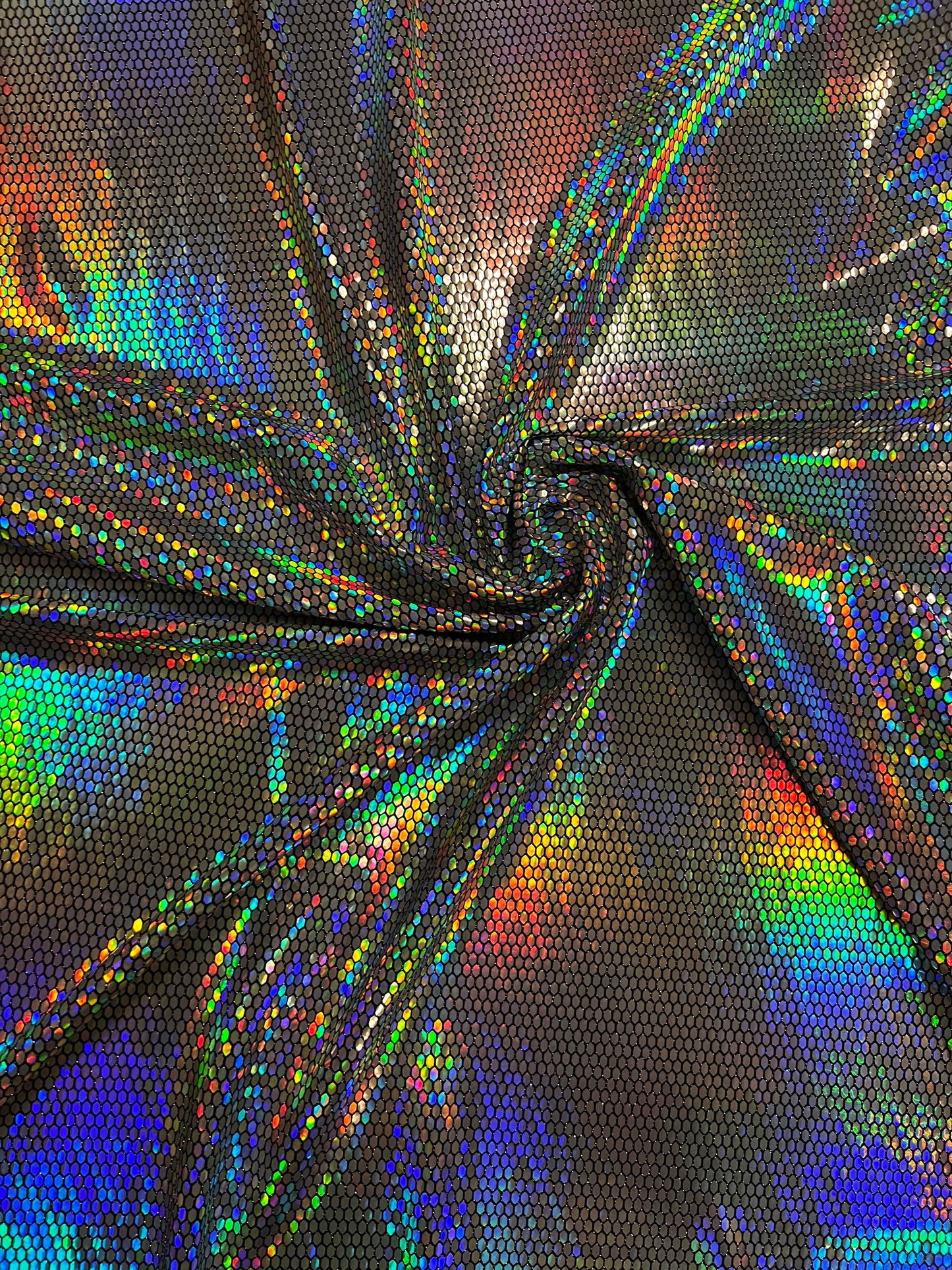 Honeycomb design iridescent silver lacer sequins on metallic spandex 2-way stretch 58/60” Sold by the YD. Ships Worldwide from Los Angeles