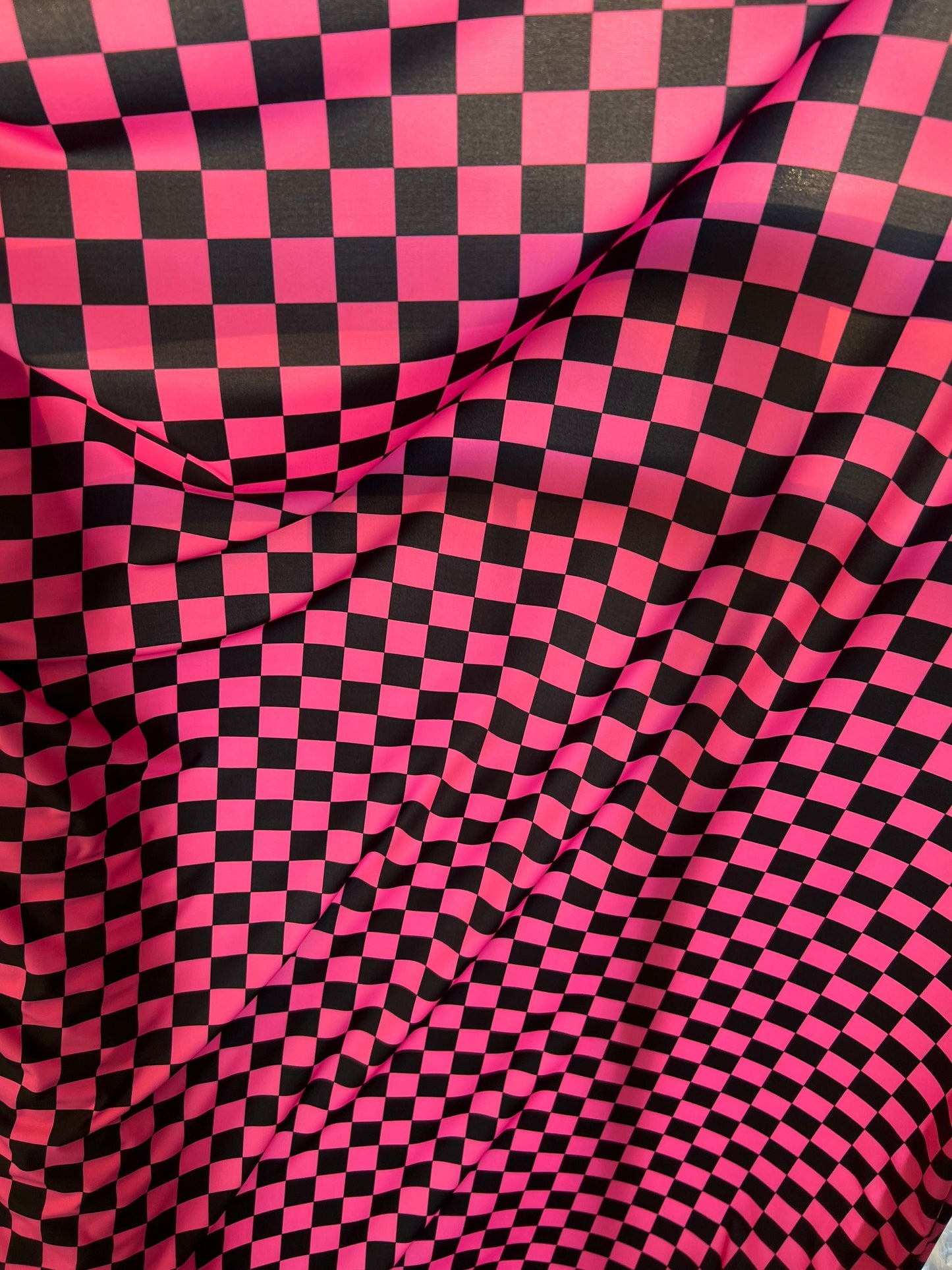 Checkers design 1” print on great quality of nylon spandex 4-way 58/60” Sold by the YD. Ships Worldwide from Los Angeles California USA.