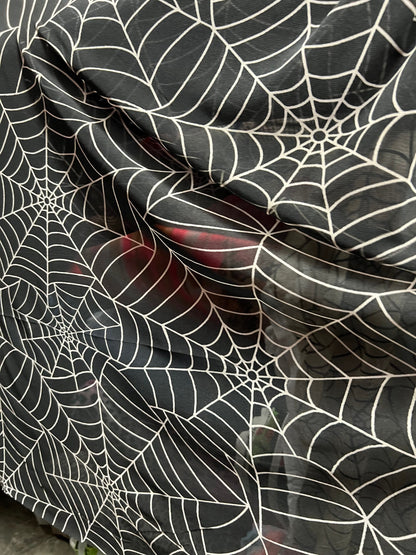 Spiderweb design print on poly mesh 4-way stretch 58/60” Sold by the YD. Ships Worldwide from Los Angeles California USA