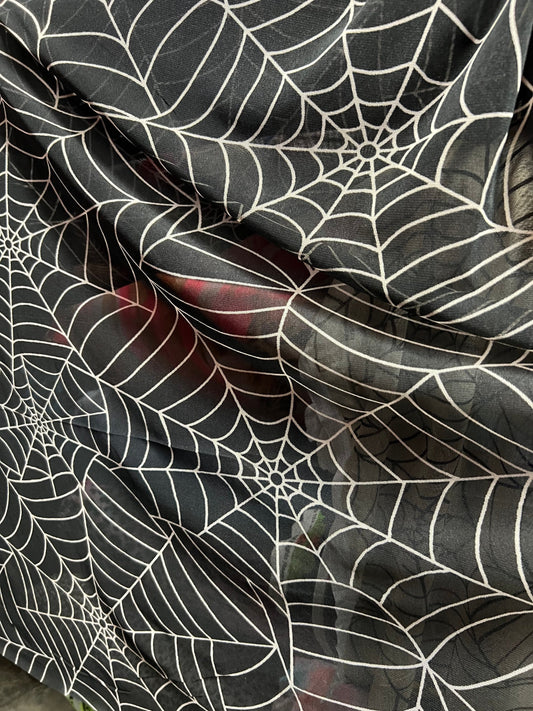 Spiderweb design print on poly mesh 4-way stretch 58/60” Sold by the YD. Ships Worldwide from Los Angeles California USA