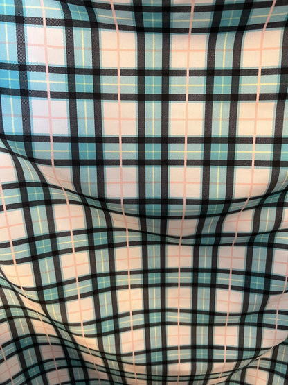 New modern plaid design Tiffany/blush pink print on great quality of nylon spandex 4-way stretch 58/60”  Sold by the YD.