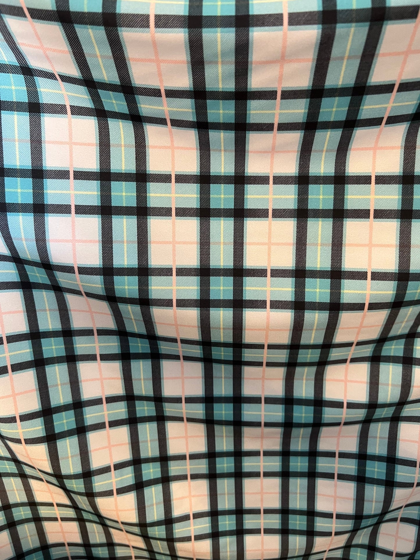 New modern plaid design Tiffany/blush pink print on great quality of nylon spandex 4-way stretch 58/60”  Sold by the YD.