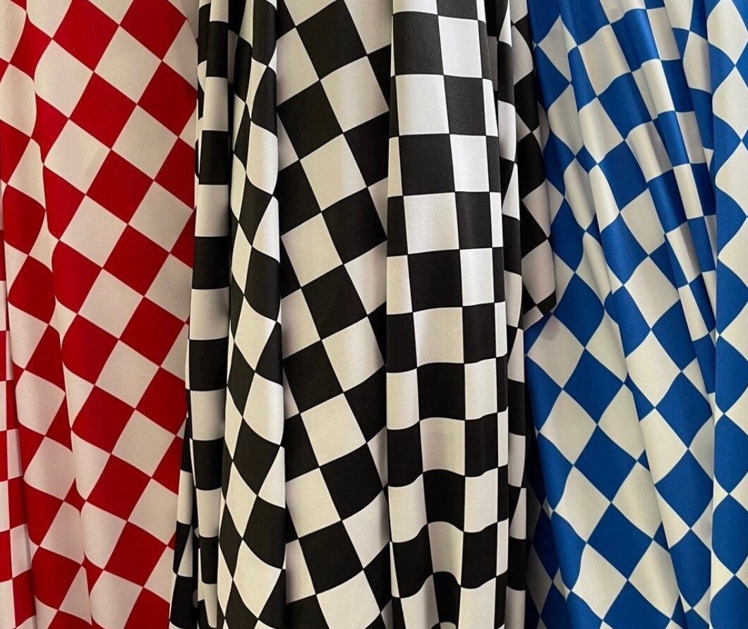 Checkers design 1” print on great quality of poly spandex 4-way stretch 58/60” Sold by the YD. Ships Worldwide from Los Angeles California