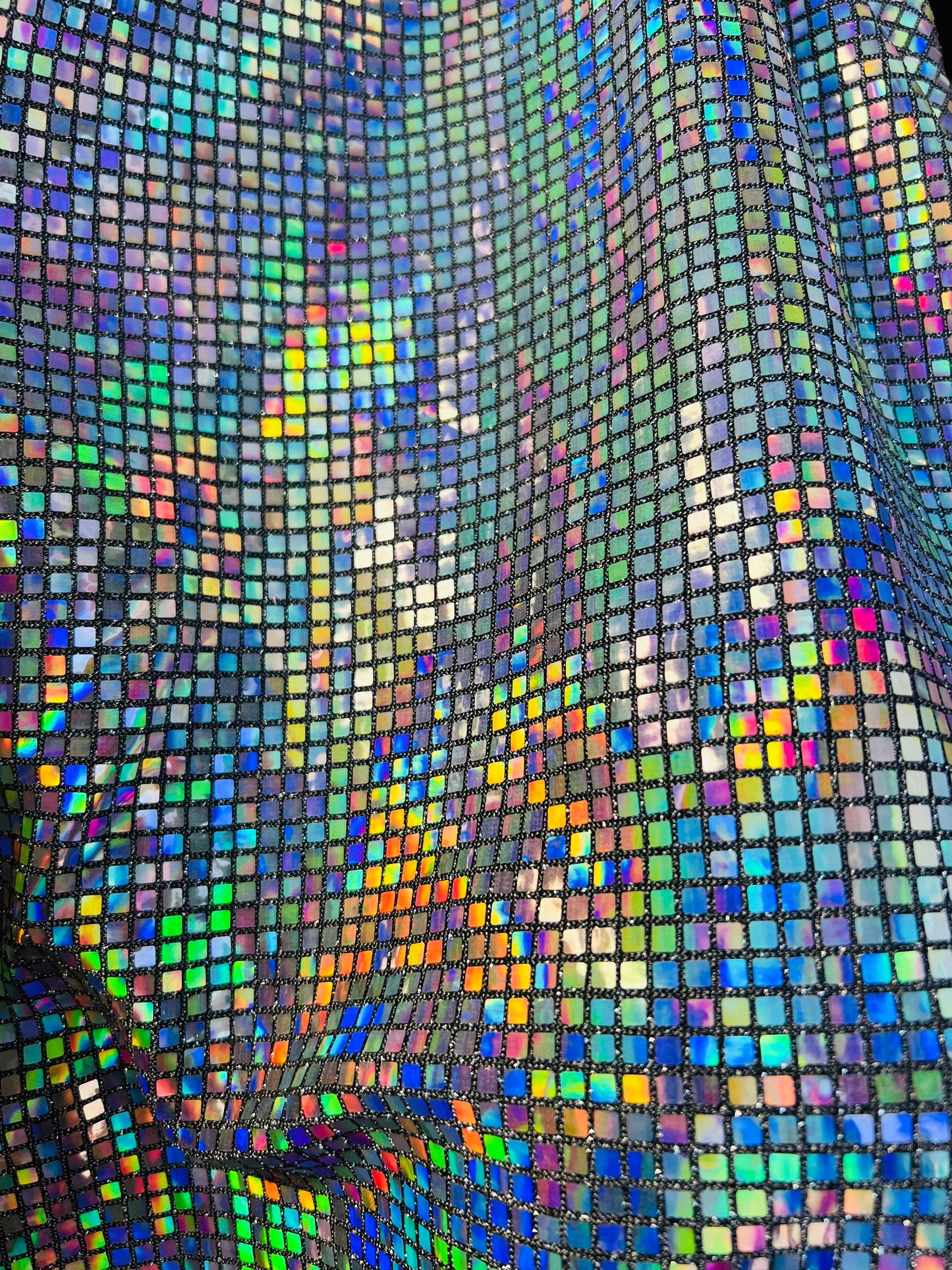 New square hologram sequins 5mm spectrum color on metallic nylon base 2-way stretch 58/60” Sold by the YD. Ships Worldwide from Los Angeles