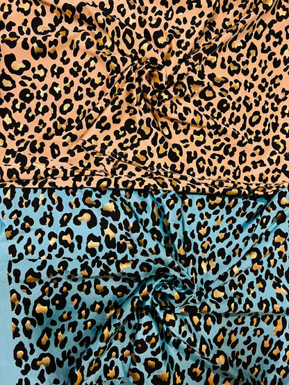 New exotic metallic leopard design nylon spandex 4-way stretch it glows in the dark 58/60” Sold by the YD. Ships worldwide from Los Angeles