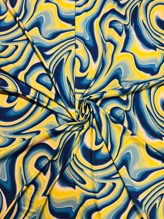 Abstract lava design yellow/blue/sapphire print on great quality of Nylon spandex 4-way stretch 58/60”